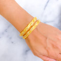 embellished-cutwork-leaf-21k-gold-bangles