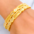 luminous-glimmering-leaf-21k-gold-bangles