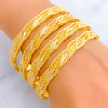 elevated-regal-leaf-21k-gold-bangles