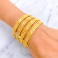 elevated-regal-leaf-21k-gold-bangles