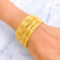 elevated-regal-leaf-21k-gold-bangles