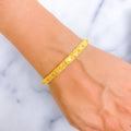 refined-brilliant-floral-21k-gold-bangle