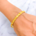 refined-brilliant-floral-21k-gold-bangle