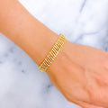 shiny-alternating-striped-diamond-18k-gold-bangle-bracelet