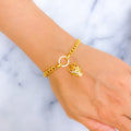 Vibrant Adorned 21k Gold CZ Bracelet