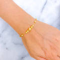 elevated-beaded-21k-gold-bracelet
