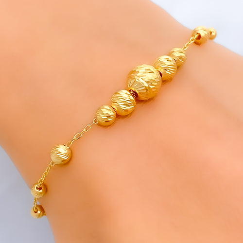 elevated-beaded-21k-gold-bracelet