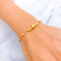 elevated-beaded-21k-gold-bracelet