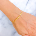 opulent-petite-21k-gold-bracelet