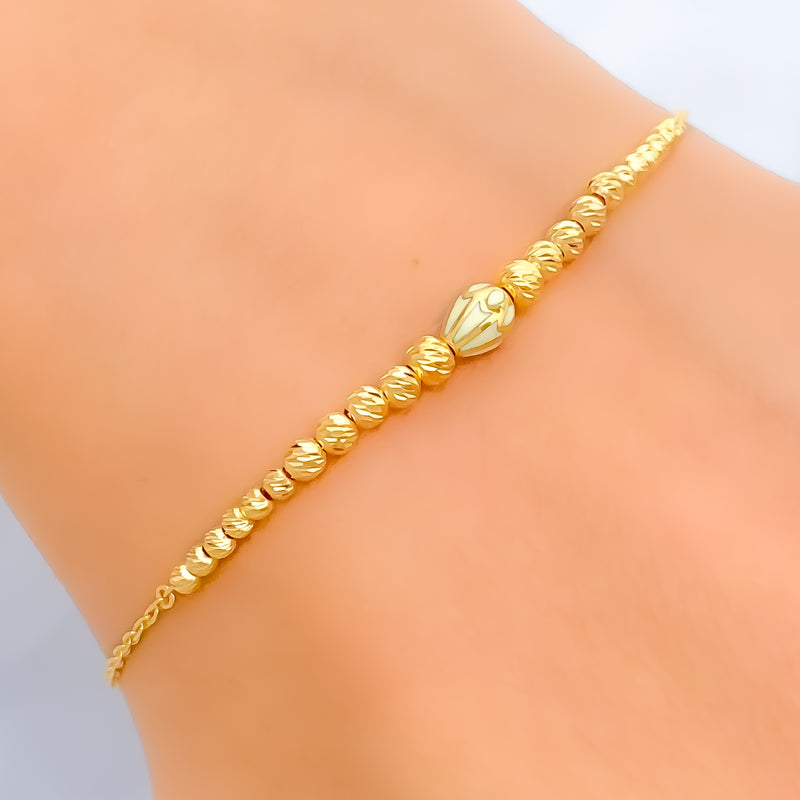 opulent-petite-21k-gold-bracelet