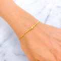 opulent-petite-21k-gold-bracelet