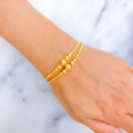 dressy-glowing-21k-gold-bracelet