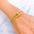 dressy-glowing-21k-gold-bracelet