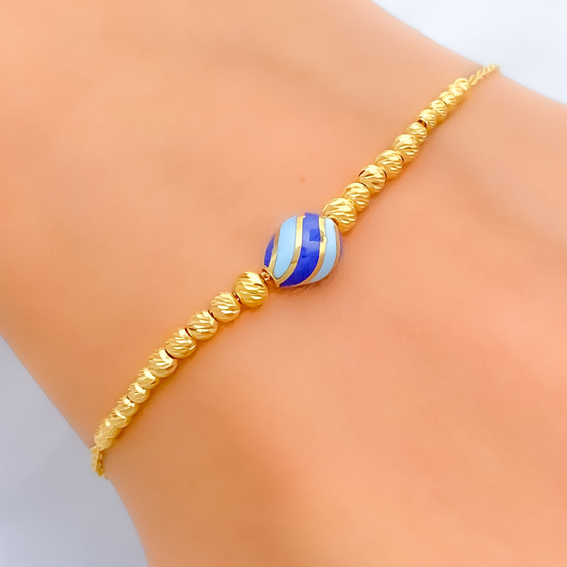 gorgeous-blue-21k-gold-bracelet