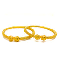 majestic-timeless-22k-gold-pipe-bangles