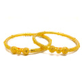 gleaming-artistic-22k-gold-pipe-bangles