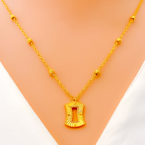 Reflective Rectangular 21k Gold Necklace 