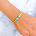 elevated-trendy-21k-gold-bangle-bracelet