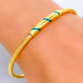 graceful-spiral-21k-gold-bangle-bracelet