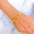 refined-engraved-21k-gold-bangle-bracelet