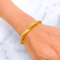 refined-engraved-21k-gold-bangle-bracelet