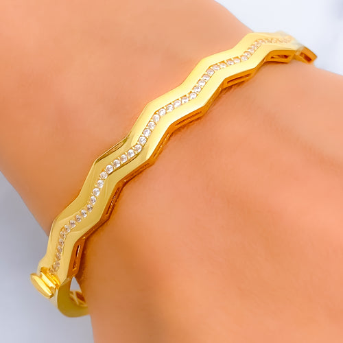 ethereal-wavy-21k-gold-bangle-bracelet