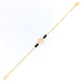 Dazzling Flower 22k Gold Black Bead Bracelet