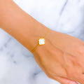 dainty-iconic-21k-gold-bracelet