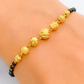 tasteful-exclusive-22k-gold-black-bead-bracelet