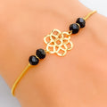 dazzling-flower-22k-gold-black-bead-bracelet