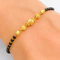 shimmering-graceful-22k-gold-black-bead-bracelet