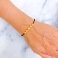 elevated-fashionable-22k-gold-black-bead-bracelet