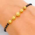 elevated-fashionable-22k-gold-black-bead-bracelet