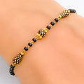 slender-everyday-22k-gold-black-bead-bracelet