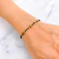 slender-everyday-22k-gold-black-bead-bracelet