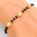 elegant-orb-22k-gold-black-bead-bracelet