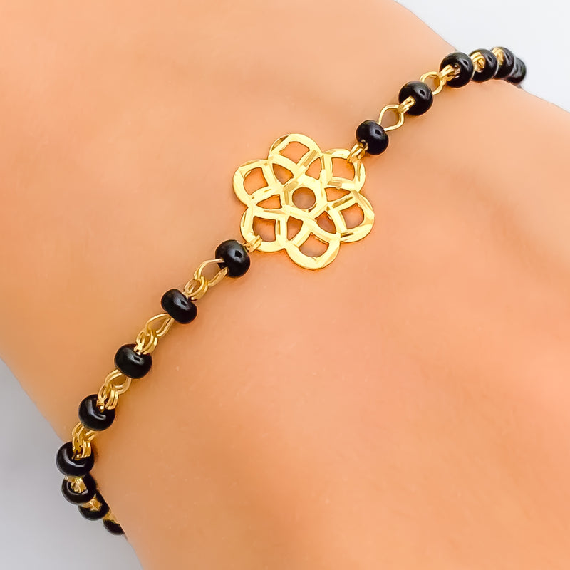 subtle-flower-22k-gold-black-bead-bracelet