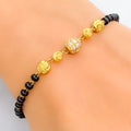 timeless-delightful-22k-gold-black-bead-bracelet