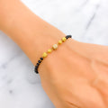 timeless-delightful-22k-gold-black-bead-bracelet