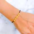 attractive-dazzling-22k-gold-black-bead-bracelet