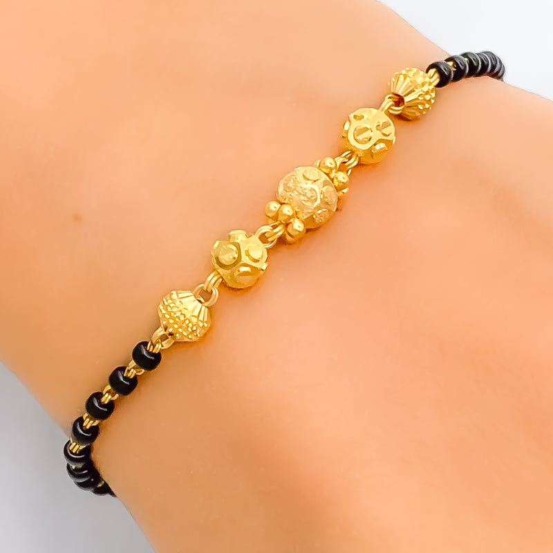 attractive-dazzling-22k-gold-black-bead-bracelet