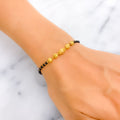 attractive-dazzling-22k-gold-black-bead-bracelet