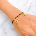 charming-stylish-22k-gold-black-bead-bracelet