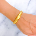 bold-flowing-21k-statement-bangle-bracelet