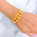 extravagant-blooming-21k-statement-bangle-bracelet