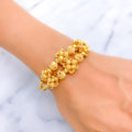 extravagant-blooming-21k-statement-bangle-bracelet