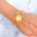 iconic-shimmering-21k-statement-bangle-bracelet