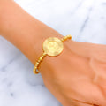 iconic-shimmering-21k-statement-bangle-bracelet