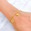 22k-gold-slender-charming-bracelet