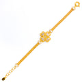 bold-flower-21k-gold-cz-bracelet